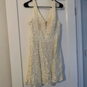 Short, off white and gold prom dress.